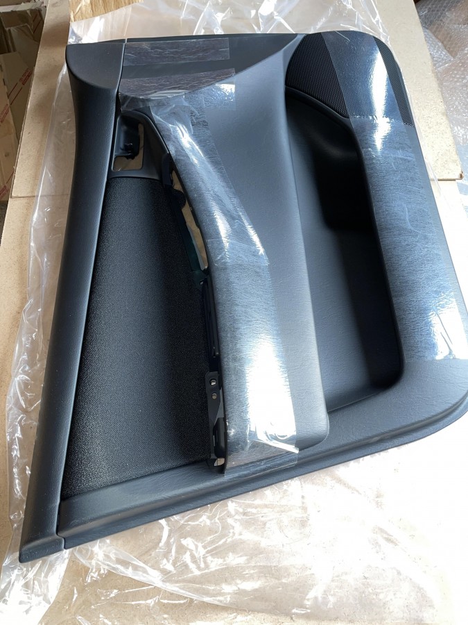 Обшивка двери передней левой TOYOTA Corolla E120 6766013020B1